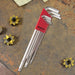 Set of hex keys in a red Bondhus tool case on a rusty metal surface with yellow metal washers.