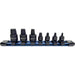 Set of drill bits on a blue holder with a white background