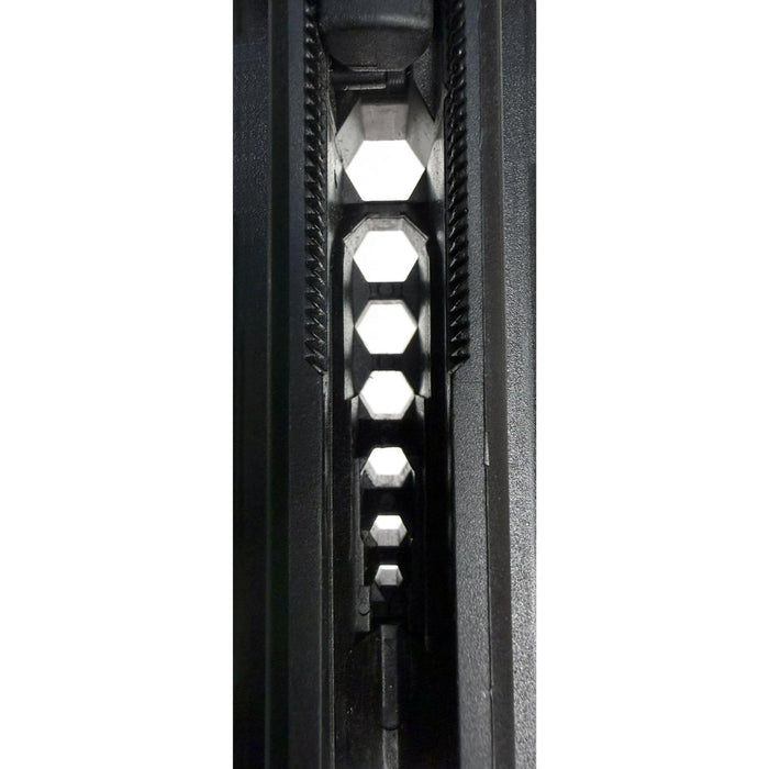 Close-up of a black honeycomb filter on a white background